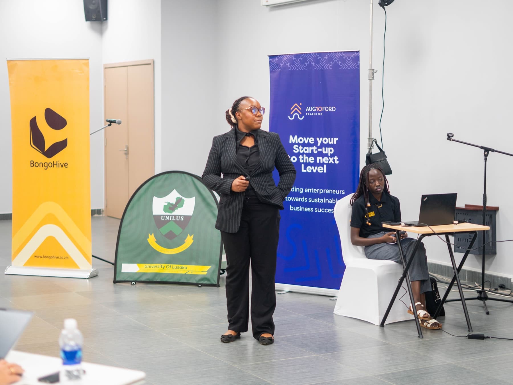 Massi Mapani presenting at a technology workshop